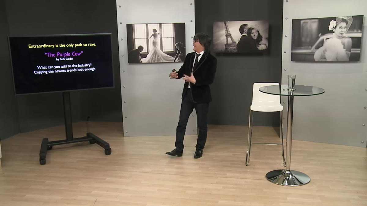 Scott speaking at a whiteboard about adding to the industry