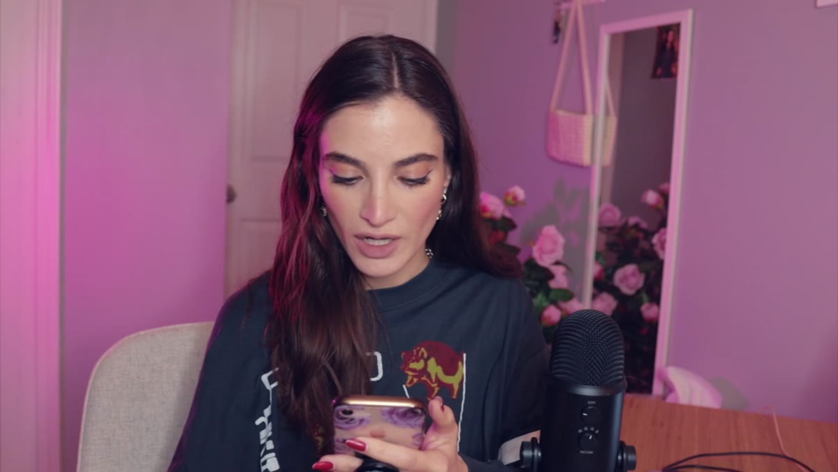 Jessica reacting with visible disbelief to client response
